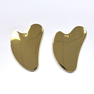 Tabla de Guasha Facial en Forma de Corazón Dorado de Aleación de Zinc para Lifting Facial y Masaje Anti-Hinchazón - Product Image 5