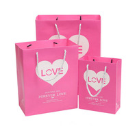 Sac en papier couché de style élégant pour mariage, artisanat, cadeau, impression offset, taille personnalisée, emballage carton jetable, logo personnalisé