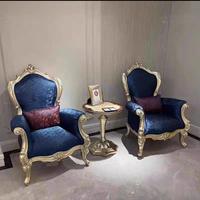 Fauteuil de loisirs en cuir véritable de première qualité de style européen avec accoudoirs sculptés et petite table intégrée pour salon et bureau
