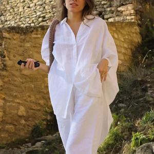 เสื้อผู้หญิงแฟชั่นใหม่ เสื้อเชิ้ตผู้หญิงลำลองทรงหลวมสีขาวติดกระดุมแขนครึ่งตัว - Product Image 3