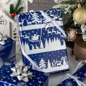 <b>Blue</b> and silver Christmas tree gift wrapping <b>paper</b> <b>roll</b> with aluminum coating featuring reindeer snowflake pattern on both side - Product Image 1