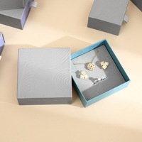 Boîte cadeau personnalisée en carton écologique pour petits bijoux et montres, avec tiroir coulissant et doublure en éponge grise