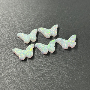 Perles d'<span class=keywords><strong>opale</strong></span> synthétique blanche <span class=keywords><strong>feu</strong></span> OP17 <span class=keywords><strong>de</strong></span> Lab Create, forme papillon double plat, <span class=keywords><strong>pierre</strong></span> <span class=keywords><strong>précieuse</strong></span> - Product Image 1