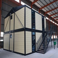 Maison conteneur pliable à double couche avec panneaux en acier et sandwich, design moderne pour entrepôt et bureau