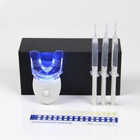 Oferta de Fábrica al por Mayor: Kit de Blanqueamiento Dental de Lujo en Caja OEM para Uso Doméstico, Tratamiento de 30 Minutos, Gel sin Peróxido de 3ml*3, 5 Bombillas LED, Plástico