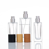 Flacon de parfum de luxe en verre transparent carré avec logo 30ml/35ml/50ml/100ml, diffuseur à roseaux vide avec pompe pulvérisatrice incluse, MOQ 100 pièces