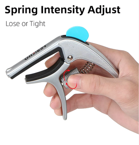 BDJ-57 HEBIKUO Accessoires d'instruments à cordes en gros, capo multifonction pour <span class=keywords><strong>guitare</strong></span> avec chevilles d'accordage pour ukulélés et guitares - Product Image 1