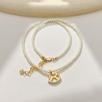 Collier ras-de-cou en laiton avec perles minuscules, pendentif cheval à bascule animalier tendance, zircon doré, bijoux de mode pour femme, vente en gros pour fêtes
