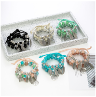 Prix d'usine Charme Bohème Ensemble de bijoux bracelets à perles de verre superposées, bracelets à pendentif feuille uniques de créateur, pour couple 2026