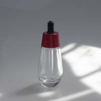 Flacon compte-gouttes en verre cylindrique pour huile essentielle cosmétique de luxe personnalisé 30 ml 50 ml avec bouchon rouge, flacon compte-gouttes en verre pour sérum cosmétique