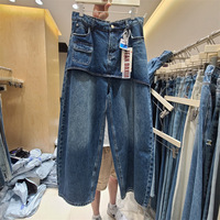 Nouvelle collection automne 2026 – Jean large délavé bleu effet usé, coupe décontractée chic, style deux pièces, ourlet effiloché, pour femme – Vente en gros