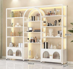 Vitrine d'exposition multi-niveaux éclairée pour <span class=keywords><strong>salon</strong></span> <span class=keywords><strong>de</strong></span> beauté, <span class=keywords><strong>salon</strong></span> <span class=keywords><strong>de</strong></span> manucure, contient du vernis à ongles, du gel, des cosmétiques, étagère <span class=keywords><strong>de</strong></span> rangement commerciale - Product Image 1