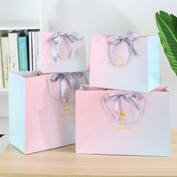 Sac cadeau de luxe rose tendance avec logo personnalisé imprimé, poignées en ruban, pour bijoux et souvenirs