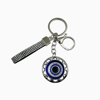 Pendentif en forme d'éléphant avec œil porte-bonheur, entièrement orné de strass étincelants et de pompons, ornement suspendu de haute qualité, porte-clés le plus vendu