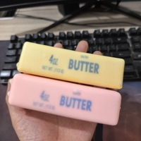 Jouet sensoriel en PU souple et à montée lente, en forme de bâton de beurre, pour soulager le stress des étudiants, emballé en boîte, vente en gros d'usine