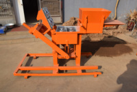 Machine de fabrication de briques à emboîtement en argile pressée à la main 2-40 blocs de terre en argile