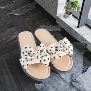High Quality Women's <b>slippers</b> Fashionable Summer Open Toe One-Word Sandals Comfortable Soft Bottom Bow <b>Slippers</b> Beach <b>slippers</b> - Product Image 2