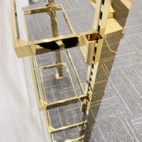 Présentoir mural pour chaussures en acier inoxydable pour magasin de vêtements et de chaussures
