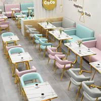 Ensemble de mobilier commercial moderne pour restaurant, café et salon de thé, avec banquette et chaise rose