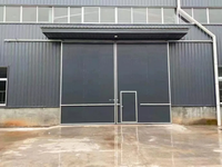 Porte coulissante électrique industrielle avec commande manuelle, panneau sandwich en mousse PU pour entrepôt et atelier