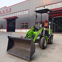 Spedizione Gratuita YHMG Mini Trattore Articolato Elettrico a Batteria 4WD con Caricatore Frontale per Uso Agricolo, Garanzia 1 Anno