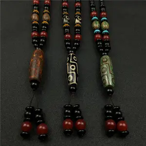 Collana Nepal fatta a mano buddista Mala perline di legno ciondolo e collana corno etnico ong Statement Jewelry
