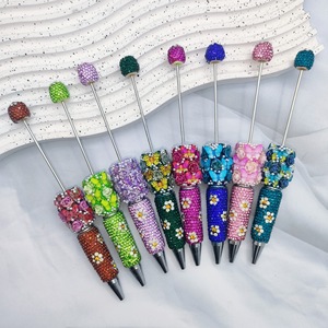 Stylo bille rotatif de luxe, orné de perles et entièrement serti de diamants, avec motif <span class=keywords><strong>papillon</strong></span>, rose et marguerite, au design élégant - Product Image 2