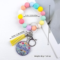 Nouveauté 2026 : Porte-clés en silicone perlé style mignon, avec pompon en PU hexagonal, pour bracelets et porte-clés – Vente en gros