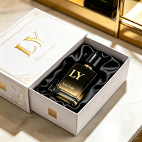 Boîte cadeau noire artisanale de luxe personnalisée de 50 ml pour parfum, avec tiroir coulissant en papier, logo en relief, doublure en éponge, matériaux recyclés