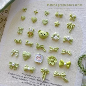 Novedad: 10 piezas/bolsa de dijes 3D para uñas con diseño de corazón y lazo verde esmerilado, joyería de moda con diamantes de imitación para manicura y salones de uñas. - Product Image 1