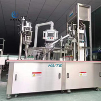 Machine de capsulage de remplissage de poche de bec de qualité supérieure 10ml-5000ml Machine de cachetage de remplissage de lait de sauce détergente pour Doypack/sac d'aspiration