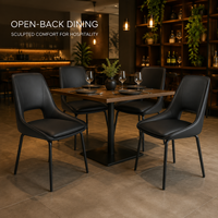 Ensemble de chaises de salle à manger noires mates à dossier ouvert, table carrée sculptée avec découpe, piédestal noir