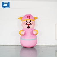 Modèle gonflable rose de dessin animé du Dieu de la Richesse pour la publicité et la décoration de centres commerciaux et de festivals