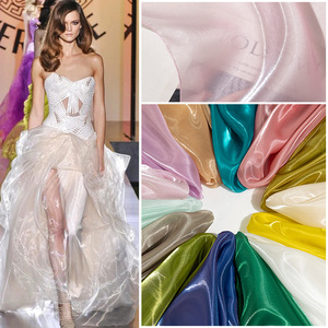 Tessuto Verde Avocado Luminoso, Organza Liquida Leggera, Tessuto Satinato con Cristalli Scintillanti Fatto a Mano per Abiti da Sposa - Product Image 1