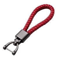 Vente chaude : Porte-clés de luxe pour voiture, style professionnel et mode, compact, en corde tressée à la main, avec mousqueton en alliage, léger et rotatif, forme fer à cheval