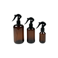 Flacon pompe en plastique PET rond transparent brun ambré de 100 ml, 200 ml, 250 ml pour liquide de parfum avec pulvérisateur à gâchette noir