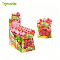 Bonbons gélifiés en gros, fourrés et juteux, en forme d'œil, de pastèque et de fraise, type fudge sandwich, en sachet pour enfants