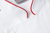 Veste de chef à col montant avec logo personnalisé et passepoil rouge, manches longues, double boutonnage, uniforme de chef pour hôtel, restauration, boulangerie, avec tablier assorti