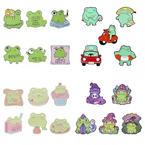 Venta al por mayor de alfileres de esmalte de ranas brujería viaje Playstation ranas broche cartas de Tarot animales arcoíris setas alfileres de solapa