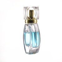 Flacon de parfum vide en verre cosmétique rond plat fantaisie de 30 ml du Pakistan, cristal, irrégulier