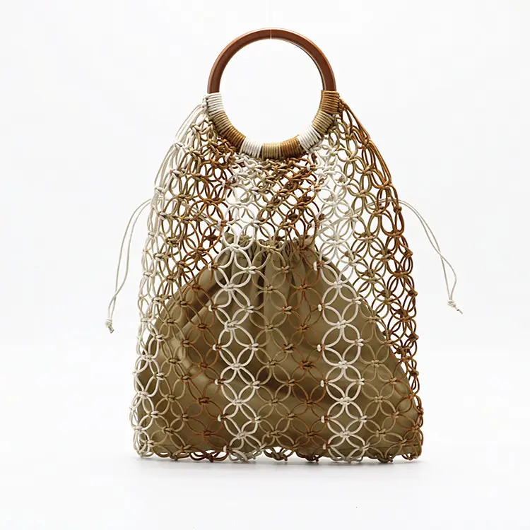 Bolsos de paja ahuecados para mujer, bolso tejido 2021, bolso de lona para mujer, bolso de cuerda de un solo tirón, bolso con cordón de algodón para playa de verano de fábrica-