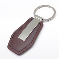 Acheter Le Plus Récent Personnalisé Pas Cher Mode Mignon Porte-clés En Métal Logo Personnalisé En Cuir Véritable Porte-clés Porte-clés Avec Boîte Fabrication