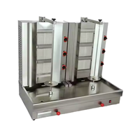 Machine à kebab au gaz en acier inoxydable à trois/quatre/cinq têtes, gril à shawarma automatique, écologique, pour restaurants et hôtels modernes