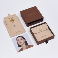 Emballage de voyage de bijoux imprimés avec logo personnalisé Pochette et boîte de sac à bijoux en microfibre à bouton pression