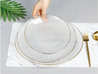 Ensemble d'assiettes à dîner modernes à bord doré Vente en gros Assiettes en verre à bord doré pour mariage Assiette de présentation en verre bon marché