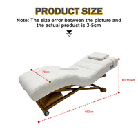 Mobilier de salon de beauté moderne : Table de massage électrique incurvée, lit facial réglable avec cadre en acier inoxydable et oreiller ergonomique en forme de S