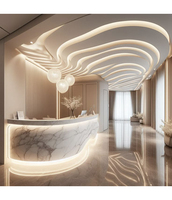 Bureau de réception commercial écologique en pierre artificielle en forme de courbe gracieuse avec éclairage LED pour hôtel et centre commercial