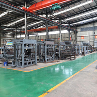 Machine à fabriquer des blocs creux entièrement automatique contrôlée par PLC QT4-25, machine à fabriquer des briques de pavage en ciment, machine à fabriquer des briques vibrantes