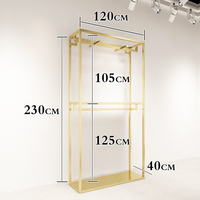 Portant à vêtements robuste en métal doré brillant en acier inoxydable pour boutique de vêtements sur mesure