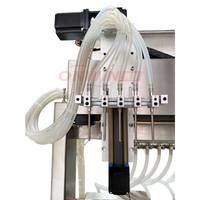 Remplisseuse automatique quantitative de petits flacons d'huiles essentielles et de parfums, idéale pour les marques en démarrage et la production en petites séries